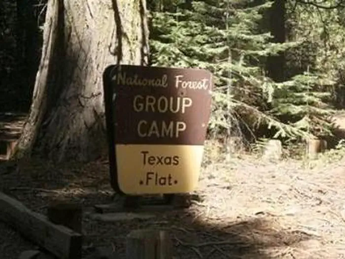 Texas Flats — A brown and yellow Forest Service sign for Texas Flats Group Camp