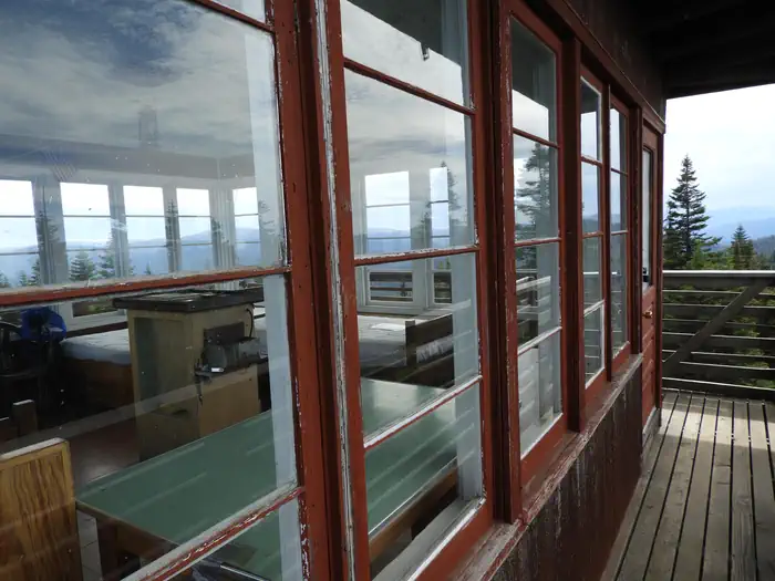 Lookout Butte Lookout — View from catwalk through windows to the inside of the lookout.