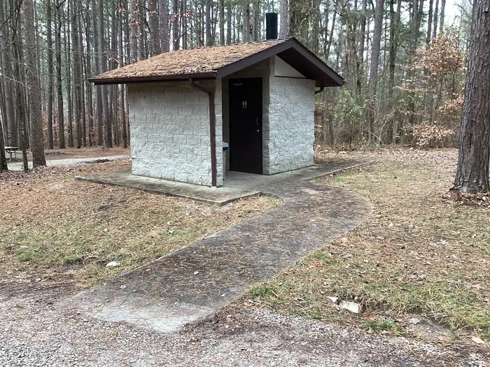 Saddle Lake Recreation Area — A photo of the vault toilet at Saddle Lake Campground
