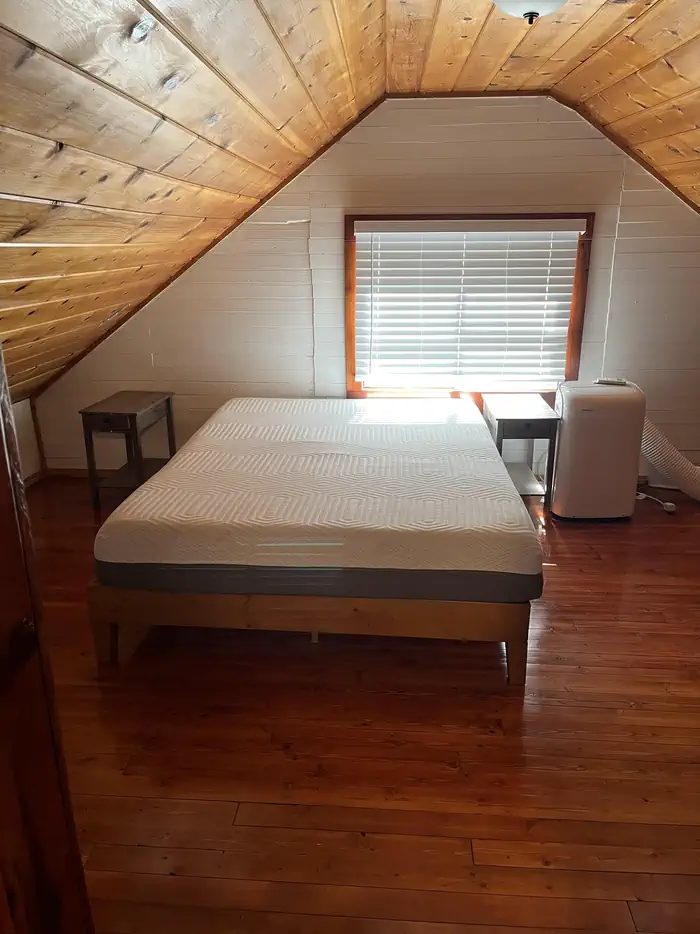 Forest Glen Guard Station — Main Bedroom on the second story of the cabin.