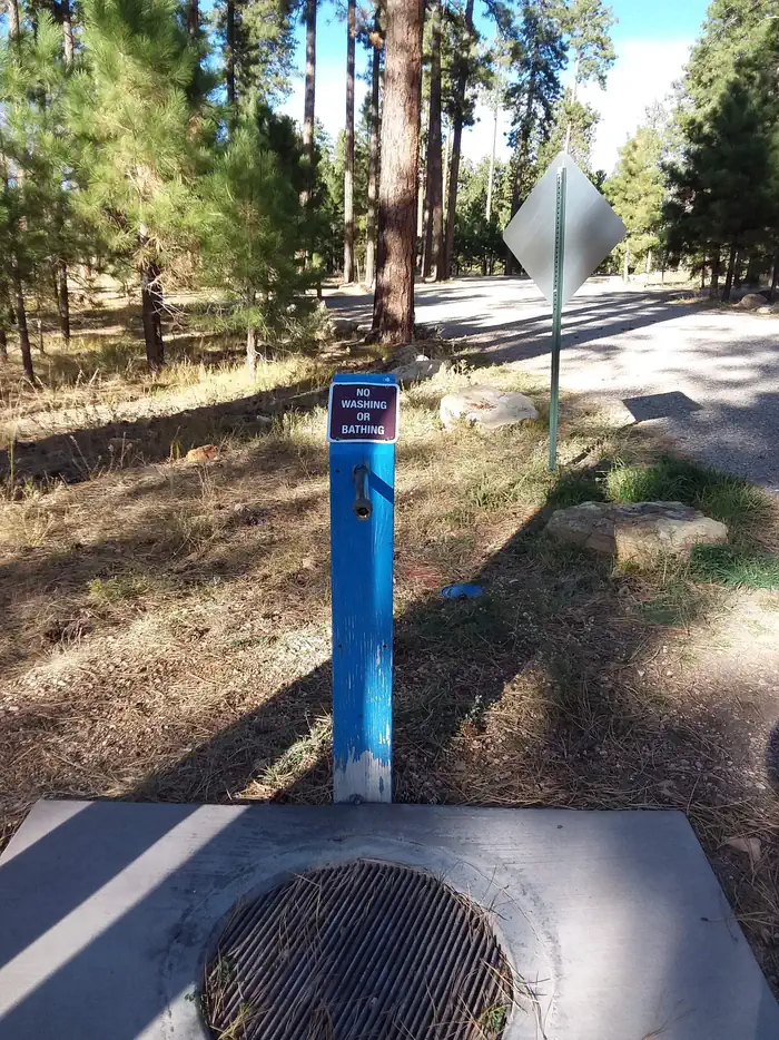 Jacob Lake Recreation Area — Water spout with no washing/bathing sign