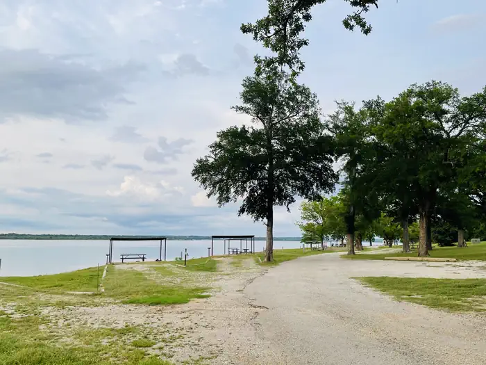Juniper Point — A photo of facility JUNIPER POINT with Picnic Table, Electricity Hookup, Fire Pit, Waterfront, Water Hookup