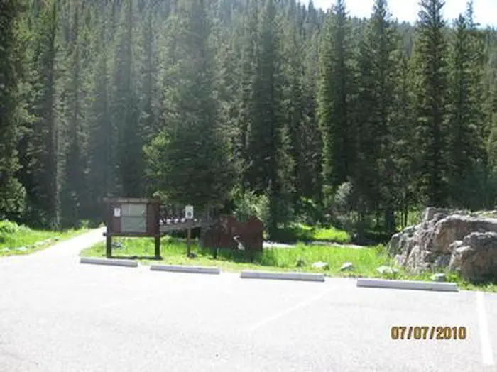 Langohr Campground — Langohr Campground trailhead, bridge to trail, signs & pine trees