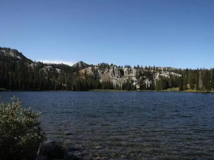 Big Trinity Lake Campground — Lake surrounded by trees and mountains