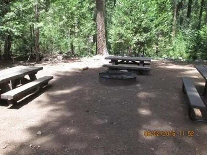 Middle Meadows Group Campground — Camp Unit 1 with picnic tables and group fire ring.
