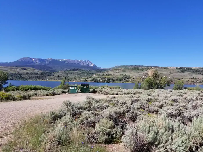 Cow Creek South Campground — Cow Creek south sage field with reservoir and mountains in background
