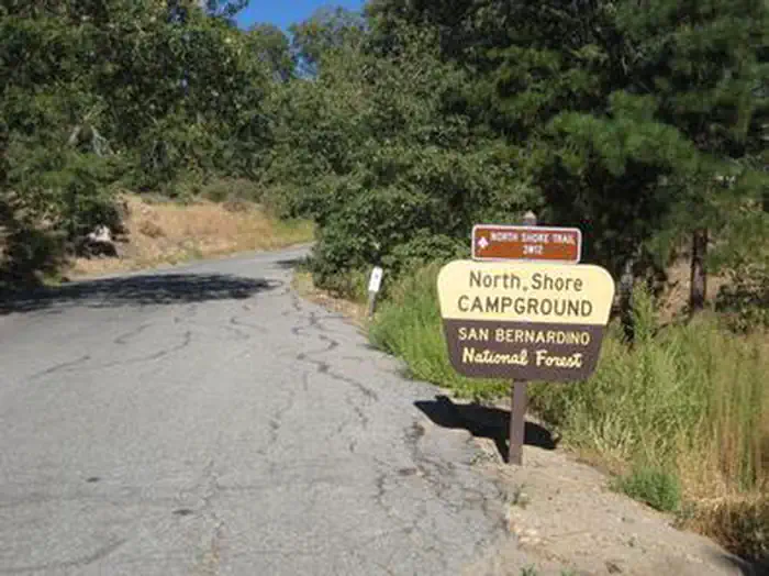 North Shore Campground  — Roadway leading up to North Shore Campground Sign
