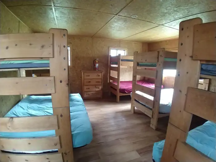 Carnero Guard Station β large bedroom with 4 bunk beds and a dresser