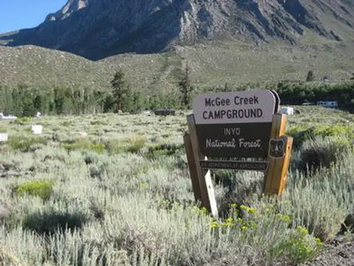 Mcgee Creek — A brown and yellow Forest Service sign for McGee Creek Campground