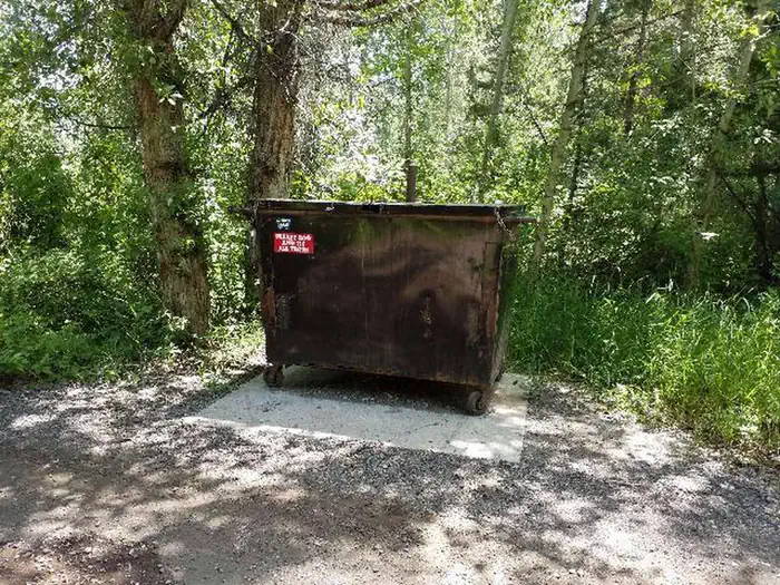 Big Game Campground — Big Game Campground trash dumpster