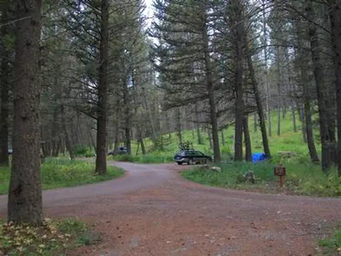 Cabin Creek Campground — CABIN CREEK CAMPGROUND road and campsite with vehicle & tent
