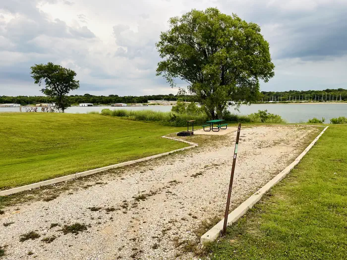 Caney Creek — A photo of facility CANEY CREEK with Picnic Table, Electricity Hookup, Fire Pit, Waterfront, Water Hookup