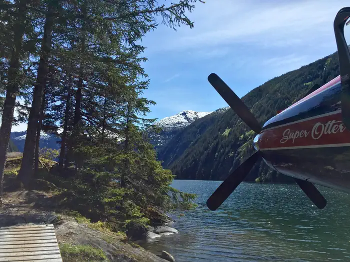 Turner Lake West Cabin — Plane dropping off cabin crew at dock