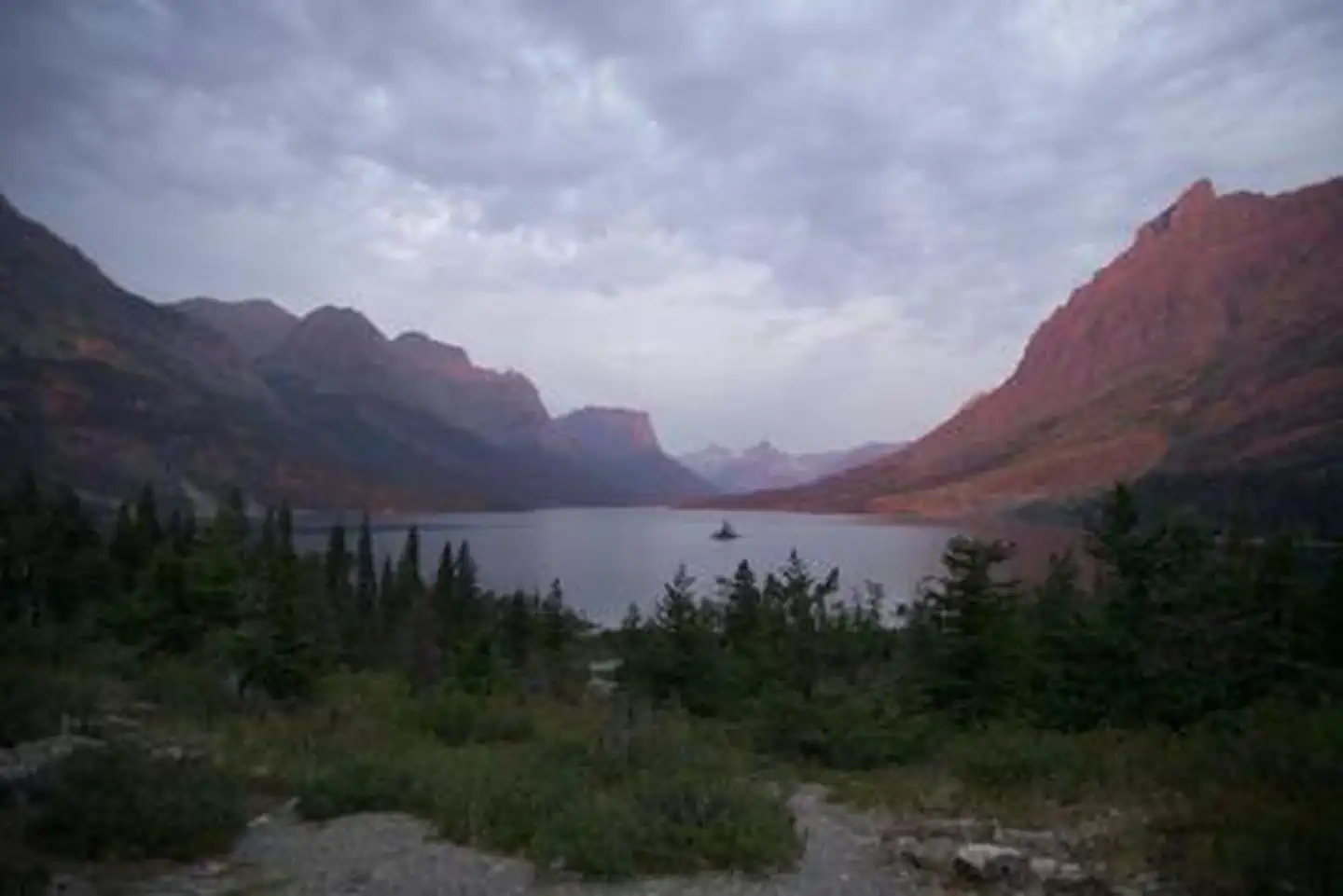 St. Mary Campground — A scenic view of a lake surrounded by rocky peaks
