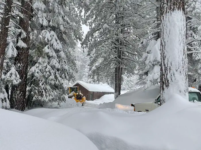 North Rim Campground — Heavy equipment plow through several feet of snow