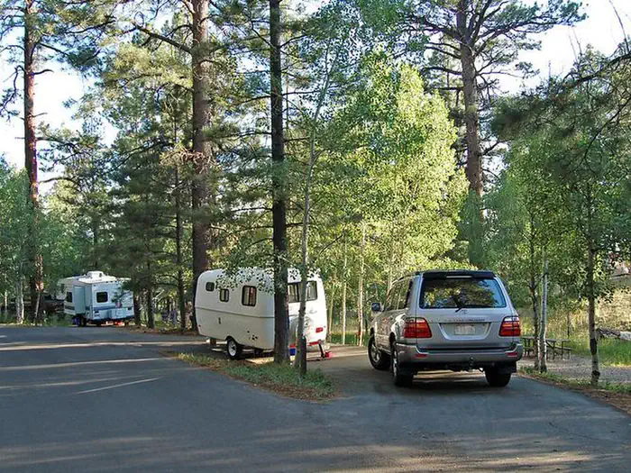North Rim Campground — Small trailers parked at campsites in the North Rim Campground