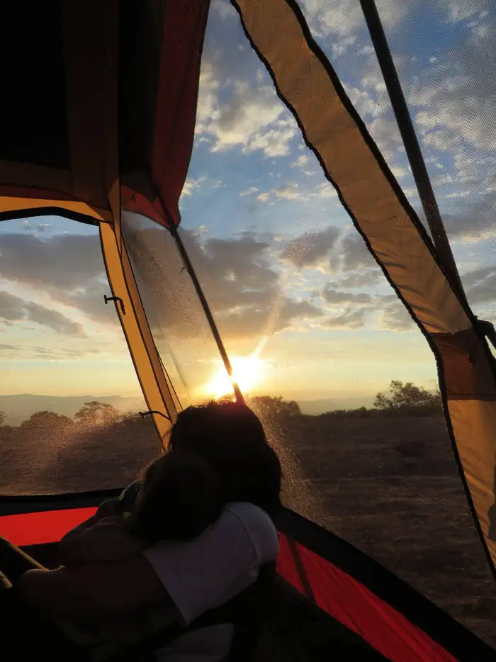Saddlehorn Campground — Sunrise From Within a Tent in Saddlehorn Campground