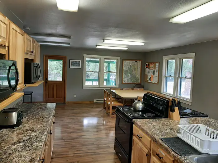 Bend Guard Station β Kitchen and eating area.