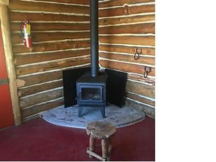 Priest Rock Cabin — The woodstove inside Priest Rock Cabin