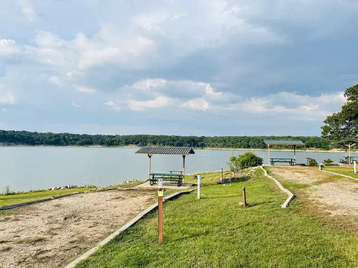 Buncombe Creek — A photo of facility BUNCOMBE CREEK with Picnic Table, Electricity Hookup, Fire Pit, Waterfront, Water Hookup