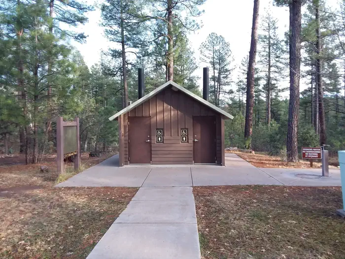 Sharp Creek — Sharp Creek Campground Loop Oak Vault Toilets with a Water Spigot to the right