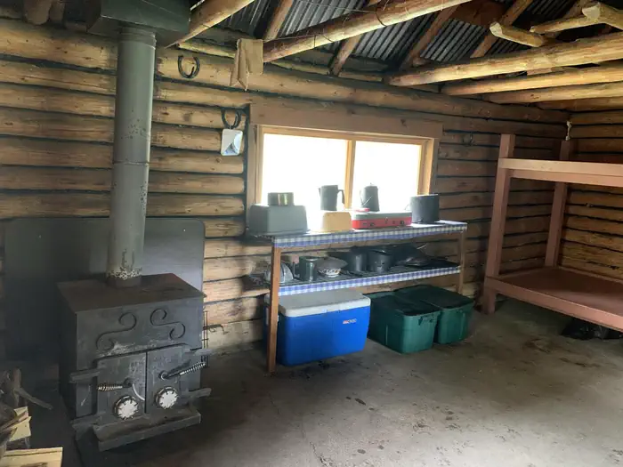 Twogood Cabin — Inside Twogood Cabin cooking area and wood stove
