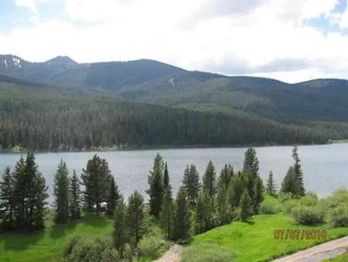 Hood Creek Campground — Hyalite Reservoir with mountains in the background