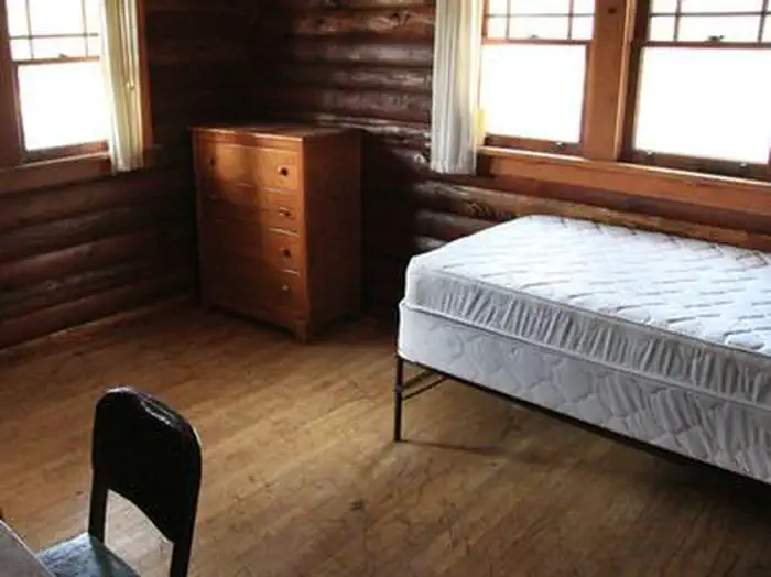 Elk Creek Cabins β single bed, chest of drawers inside cabin