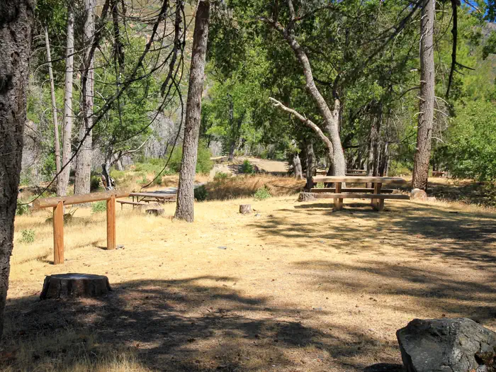 Dixie Glade Campground — Campsite with Hitching Post and Picnic Table
