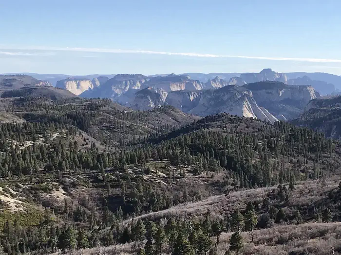 Lava Point Campground — A panoramic view from Lava Point Lookout showing peaks and mesas.