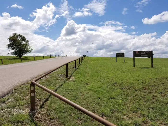 Longhorn β Longhorn Park entrance driveway and park sign