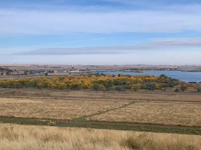 Downstream (mt) — A view of the campground from the dam in the Fall.