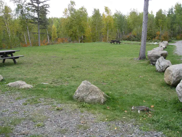 Birch Lake Campground — Picture of open grassy area.
