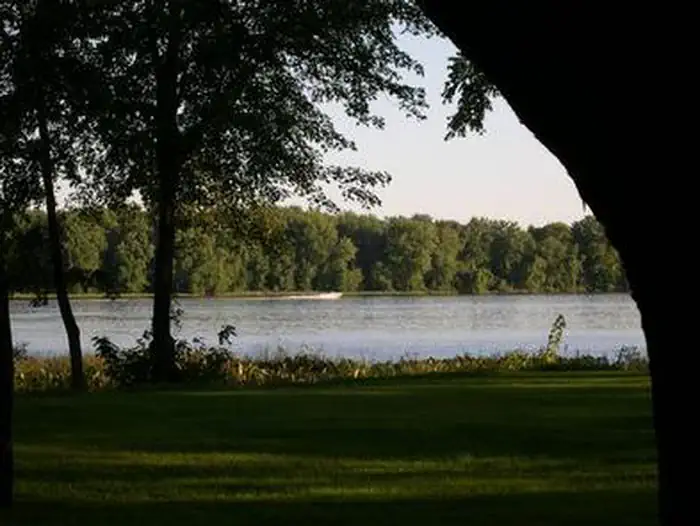 Shady Creek — Looking at Mississippi River and a speedboat going by.