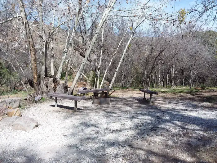 Peppersauce Campground — Group area around a fire pit.