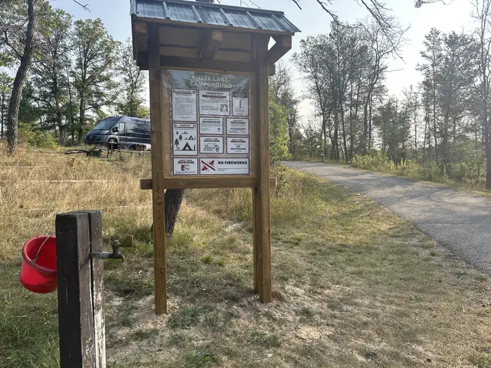 Kneff Lake Campground — A photo of water access and information kiosk at Kneff Lake Campground