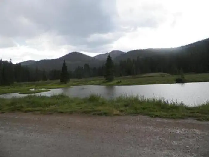 Monarch Park — Fishing pond with mountains in background