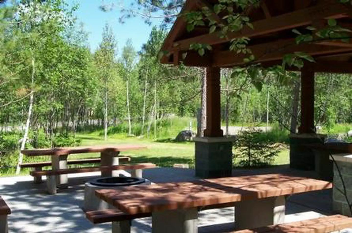 Fall Lake — Picture of group site picnic shelter and tables.