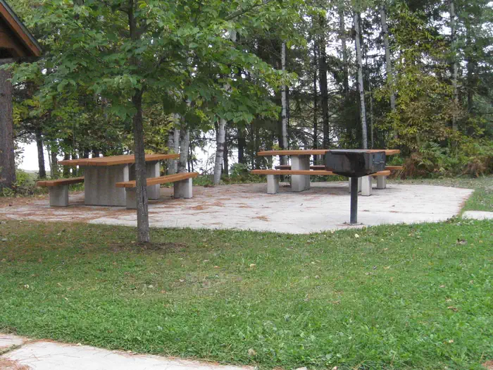 Fall Lake — Picture of picnic tables and grills.