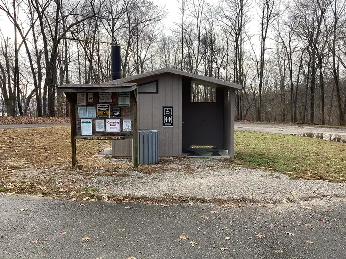 Buzzard Roost Recreation Area — Vault toilet in campground