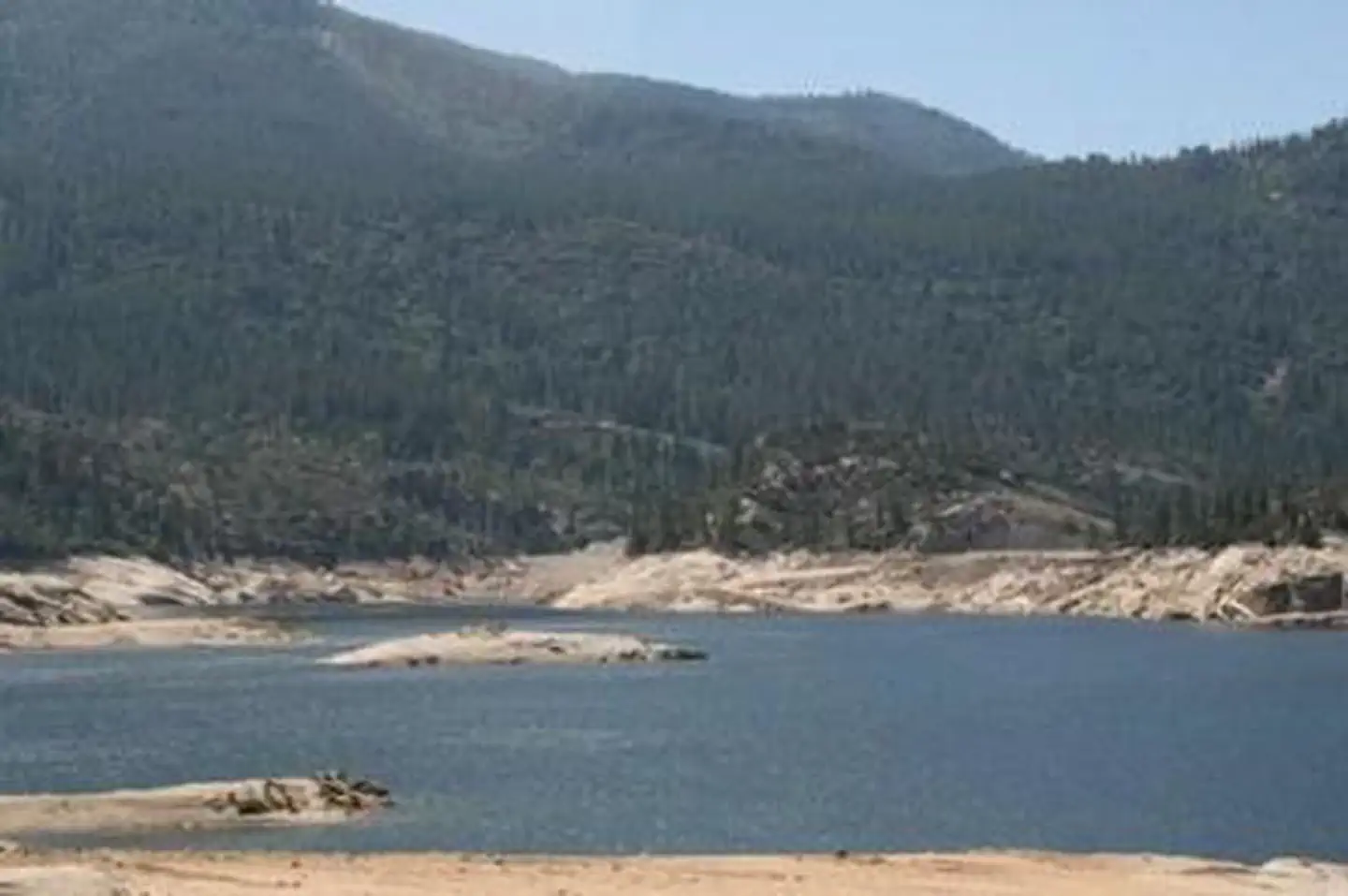 Mammoth Pool — A shallow mountain lake on a blue sky day
