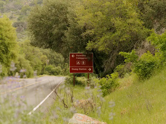 Potwisha Campground — A large brown sign, pointing the way to the entrance of Potwisha Campground from the Generals Highway