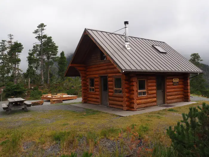 Middle Ridge Cabin — Middle Ridge Cabin with picnic table and tent platform
