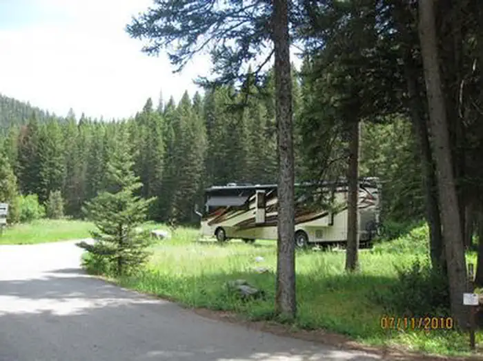 Greek Creek Campground — Greek Creek Campground - Campsite with Class A motor home