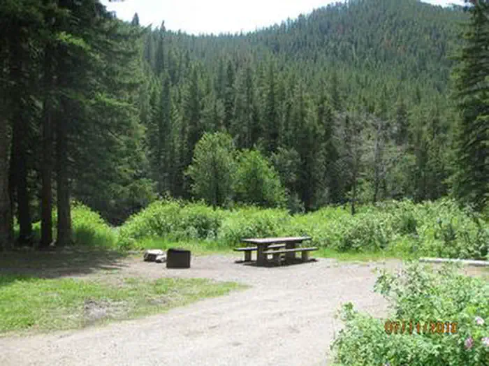 Greek Creek Campground — Greek Creek Campground - Campsite with picnic table & fire ring
