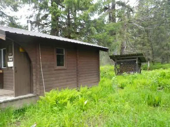 Marten Lake Cabin β Marten Lake Cabin with small woodshed