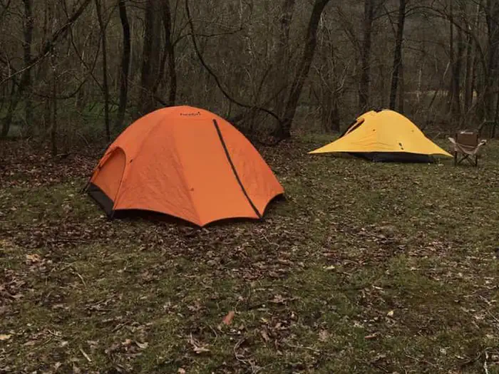 Round Spring Campground — An orange and a yellow tent  pitched at Round Spring