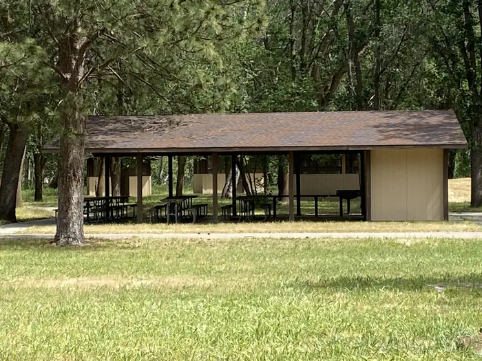 Camp Discovery Group Campground — Picnic pavilion with shade trees