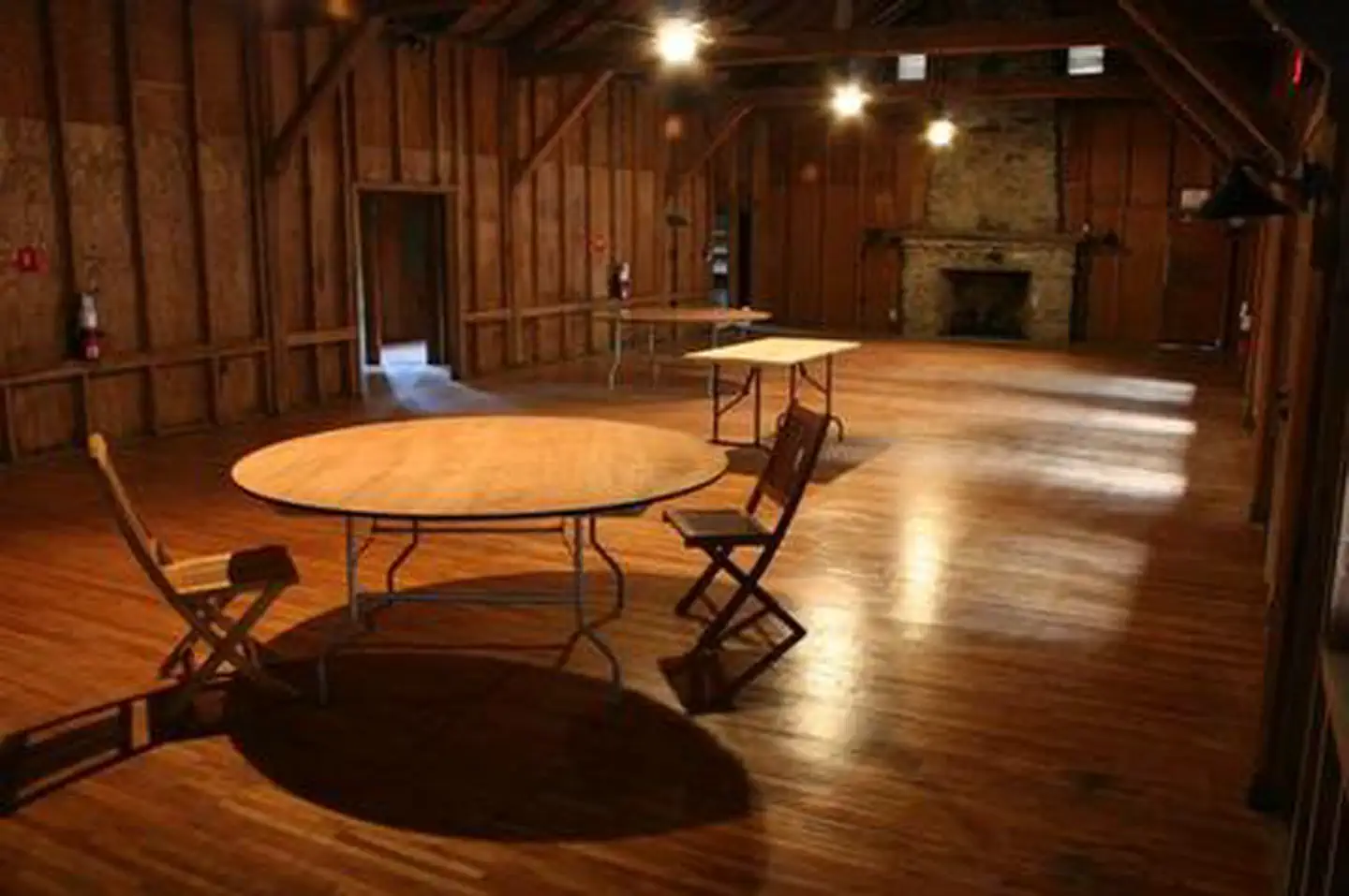 Appalachian Clubhouse — APPALACHIAN CLUBHOUSE main room with table and chairs