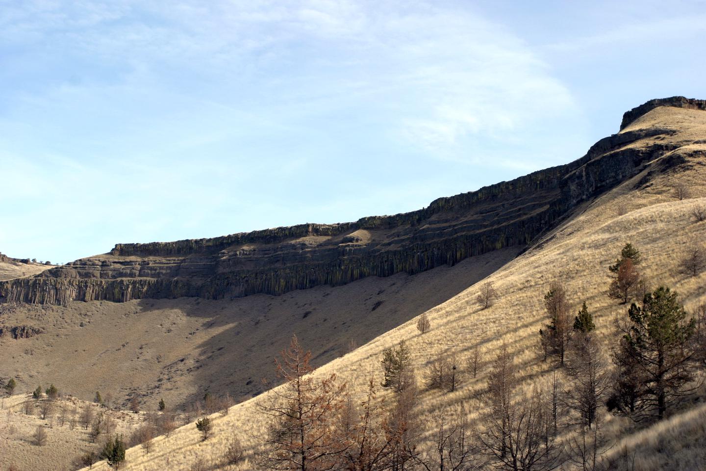 Mecca Flat Campground — Basaltic rim rock above Mecca Flat Campground.